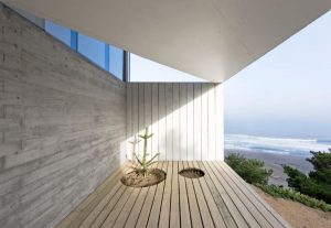 Planos y diseño interior de pequeña casa de playa, cuenta con ambientes